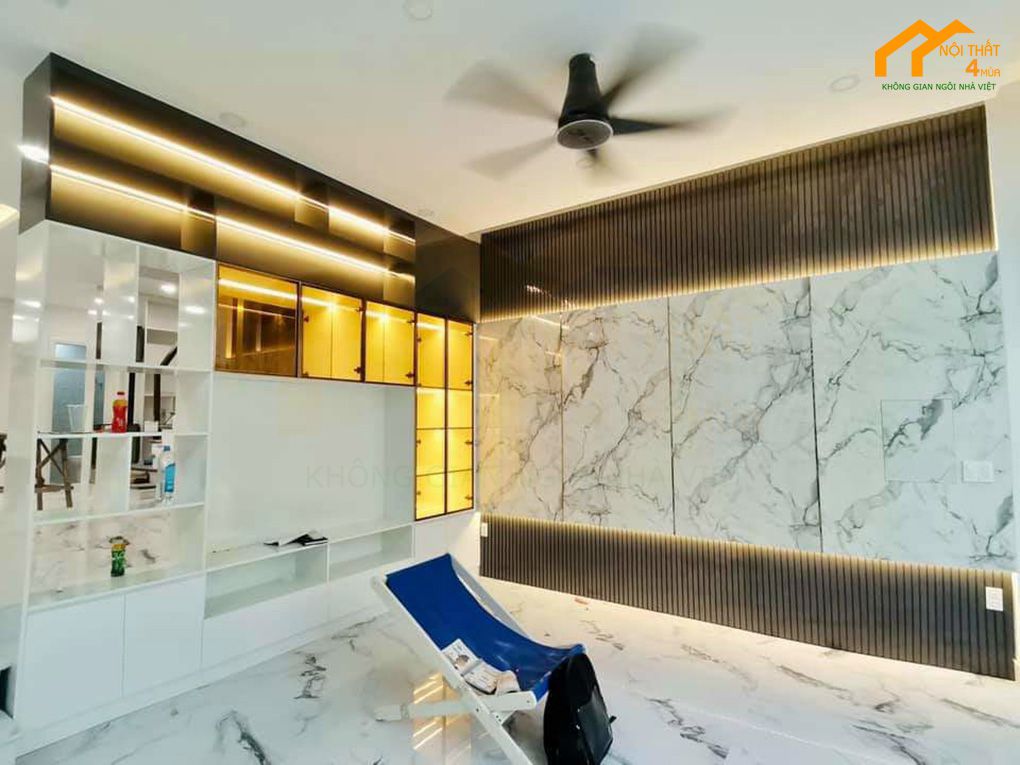 Thi công vách ốp và tủ trang trí phòng khách ấn tượng Thi công vách ốp và tủ trang trí phòng khách ấn tượng
