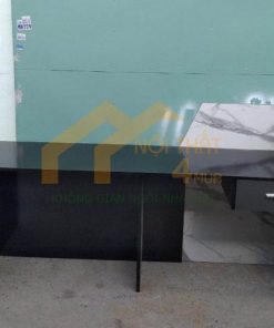 Quầy lễ tân đen phối vân đá hiện đại