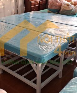 Mẫu giường spa chân sắt màu xanh chân sơn trắng