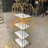 Kệ trưng bày 4 tầng bằng sắt mỹ nghệ - KTB01 1 Kệ trưng bày 4 tầng bằng sắt đẹp